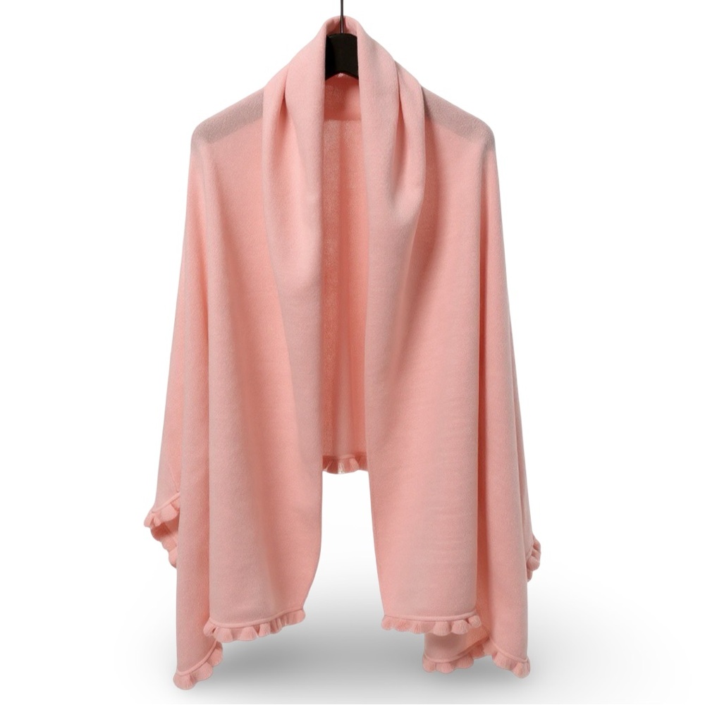 Pink knit shawl with knit ruffle trim